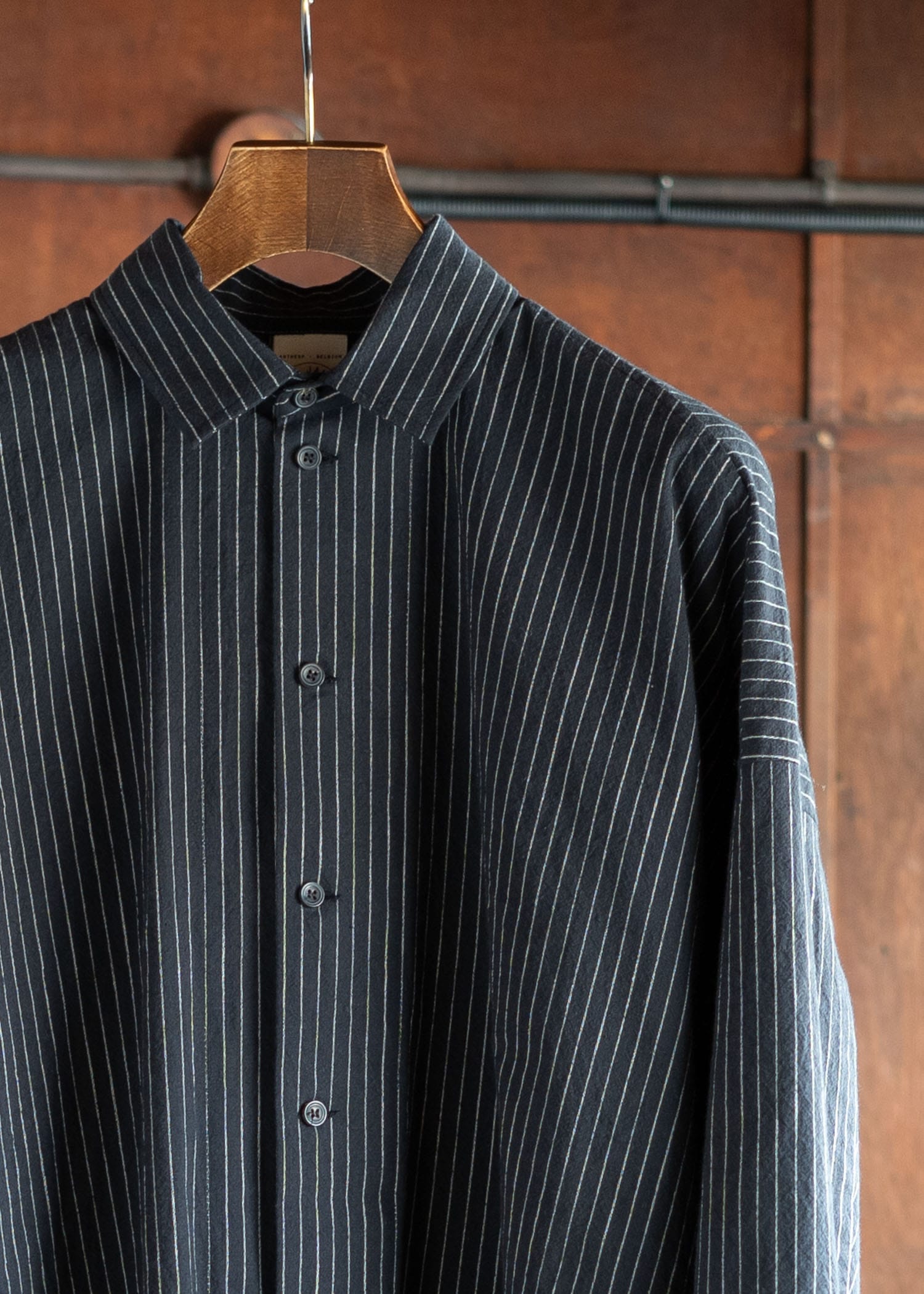 JAN-JAN VAN ESSCHE SHIRT#100 LOOSE DRESS SHIRT, BUTTON-UP AND ASYMMETRICAL PLEAT IN THE BACK COTTON SHIRTING BLACK STRIPED