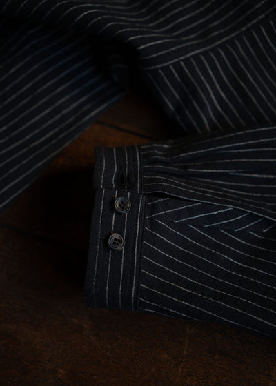 JAN-JAN VAN ESSCHE SHIRT#100 LOOSE DRESS SHIRT, BUTTON-UP AND ASYMMETRICAL PLEAT IN THE BACK COTTON SHIRTING BLACK STRIPED