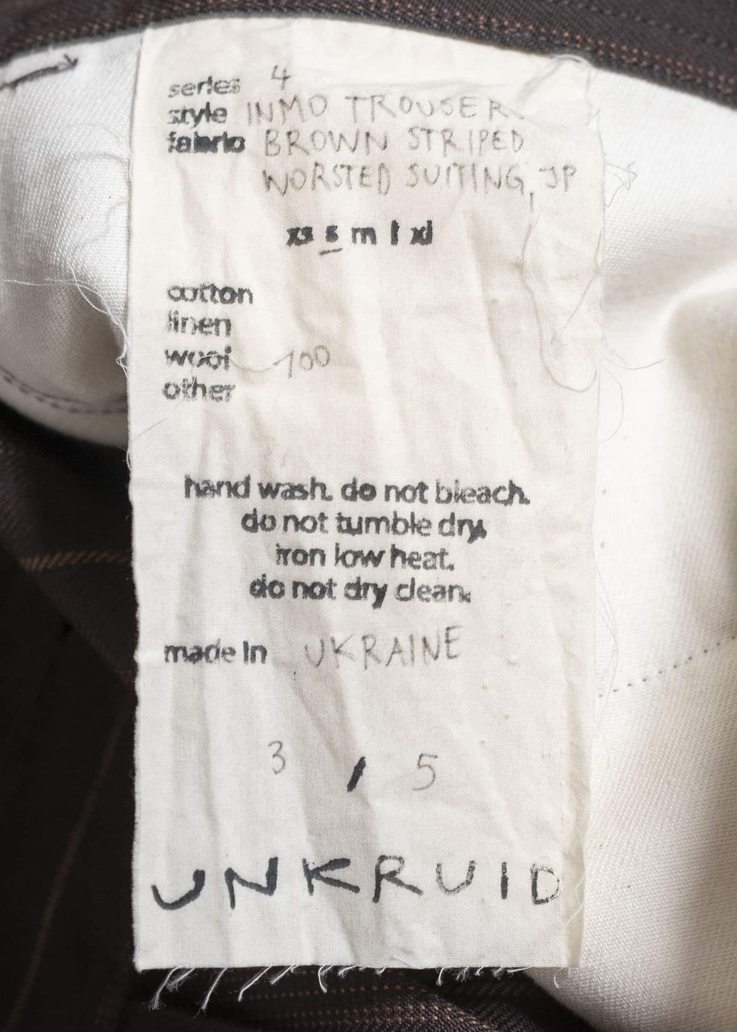 unkruid inmo trousers brown striped worsted suiting