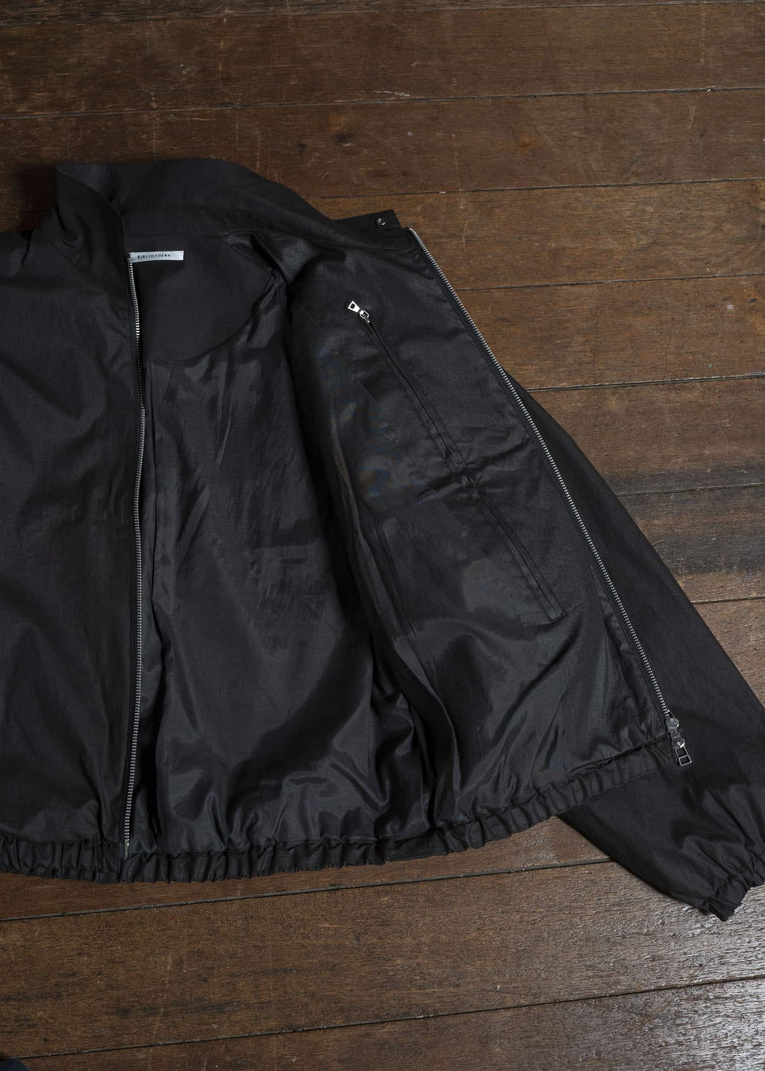 BIBLIOTHERK BR-OT06-AW25-01 DRAPED BLOUSON BLACK